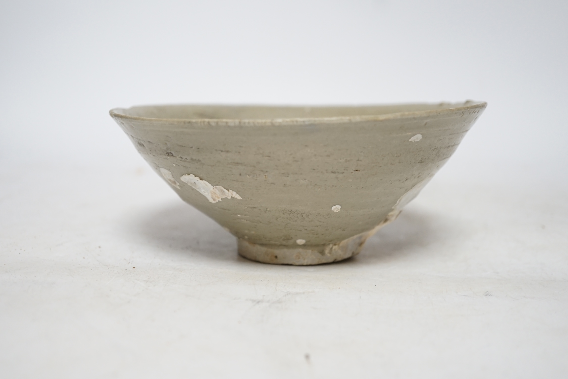 A Chinese carved shipwreck bowl, Song dynasty, 17cm diameter